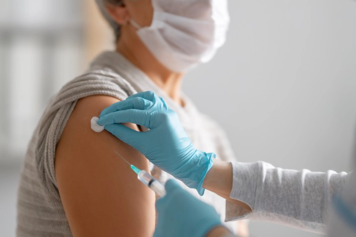 a patient receiving a vaccination